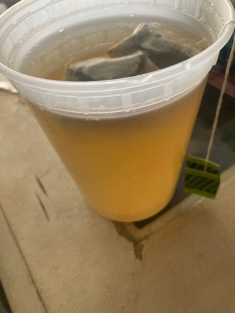 Tall bowl of green tea, picture by Fahmeena Odetta Moore