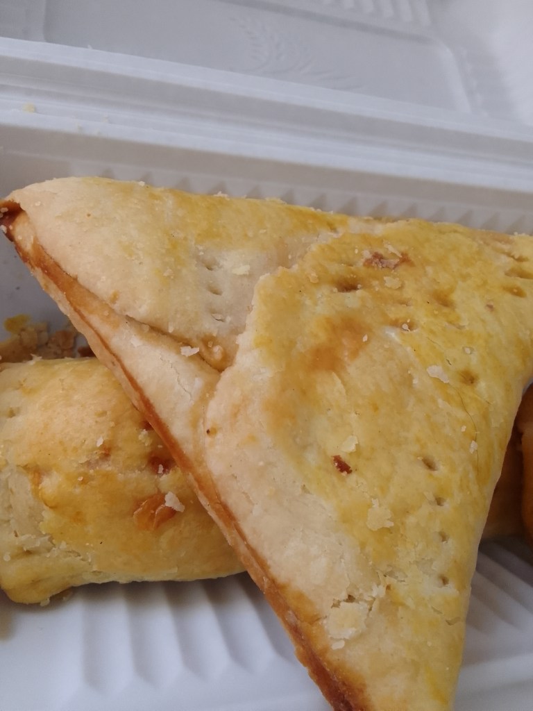 Photo of Guyanese pine tart and cheese roll.